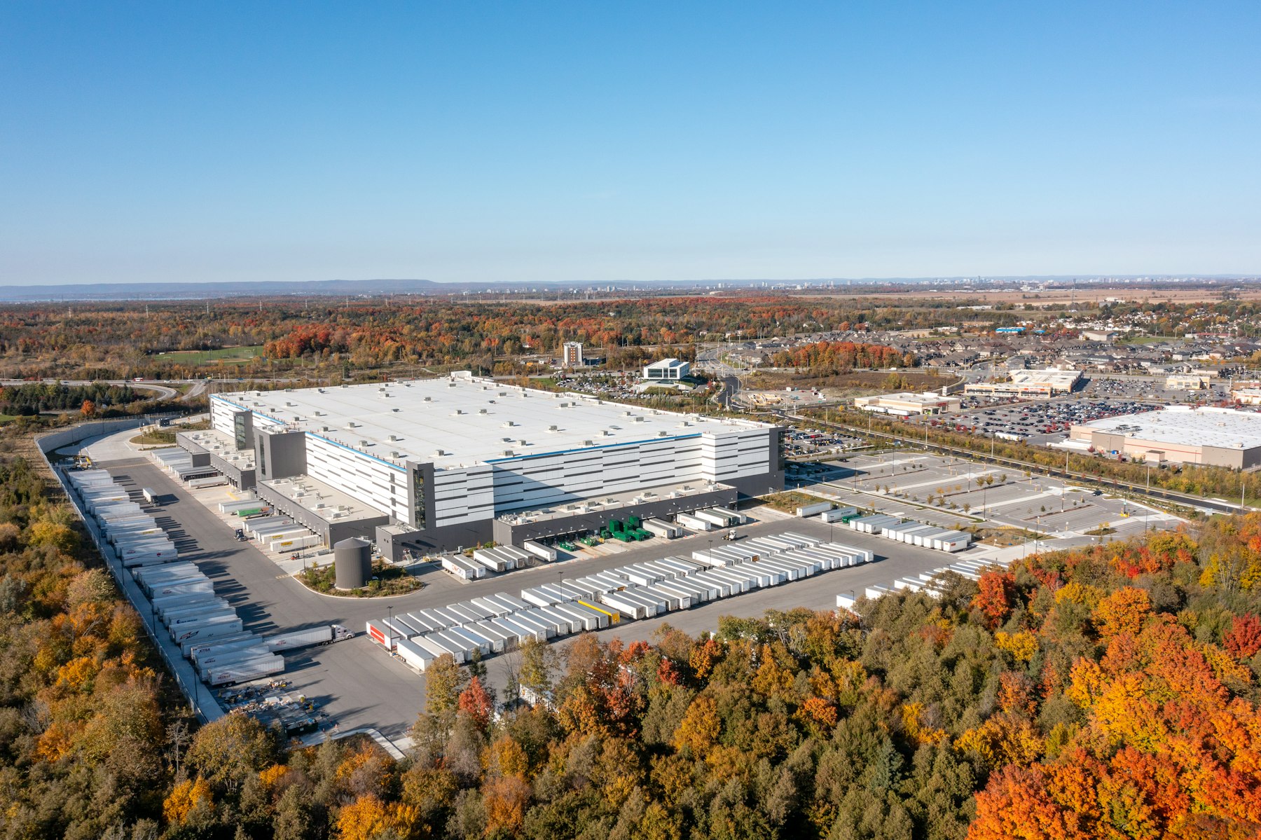 Aerial view of a modern distribution center with truck loading docks