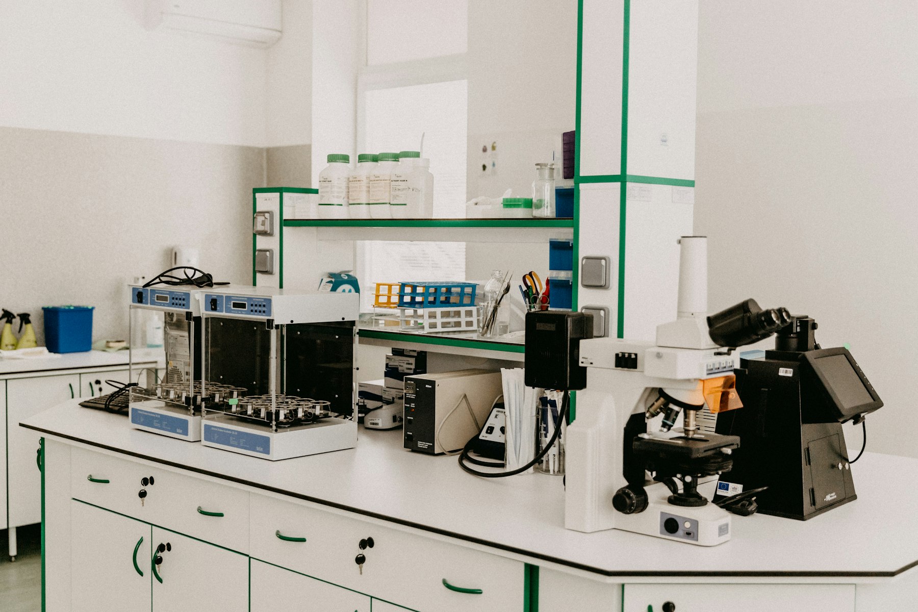 Laboratory bench with microscopes and research equipment
